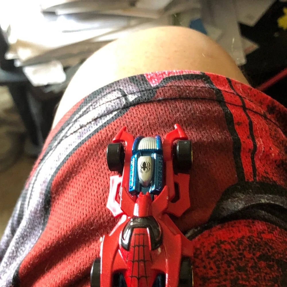 Red Spider-Themed Diecast Toy Car